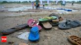 Hathras Stampede: Tragic Tales of Scattered Slippers and Shoes | Agra News - Times of India