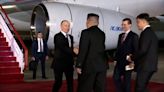 Vladimir Putin and Kim Jon-Un embrace as Putin lands in North Korea