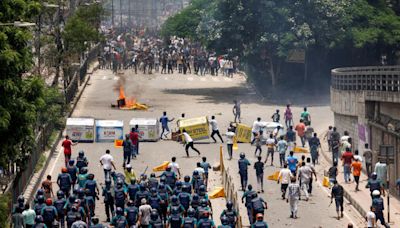 State TV set ablaze, death toll rises as student protests roil Bangladesh