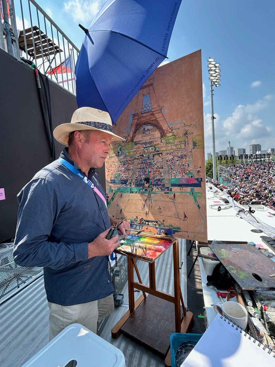 Meet the painter with the best seat at one of Paris Olympics most iconic venues