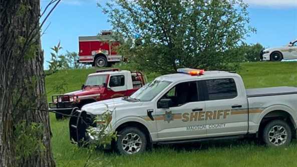 Excavator operator rescued after machine overturns in Madison County creek