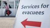 Calgary reception centre to remain open until Monday