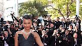 Simone Ashley Goes Dark in All Black Wearing Jimmy Choo Shoes for Cannes Closing Ceremony