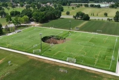 Watch: Massive sinkhole swallows soccer fields at Illinois park