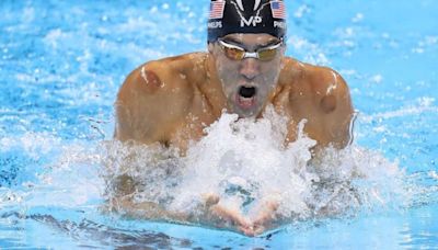 Olimpíadas 2024: Michael Phelps dá aula de natação para Snoop Dogg em Paris