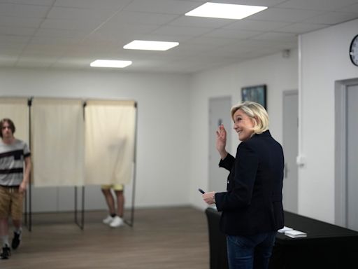 French voters surge to polls in first round of high-stakes legislative elections; turnout at 59%