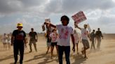 Relatives of Israeli hostages try to cross into Gaza