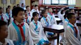 China launches campaign to halt school bullying, excessive homework