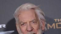 Canadian actor Donald Sutherland attends the premiere of 'The Hunger Games: Mockingjay - Part 2' at the Microsoft theatre in Los Angeles on November 16, 2015