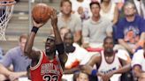 Basketball jersey worn by NBA legend Michael Jordan sells for record-breaking $10.1m