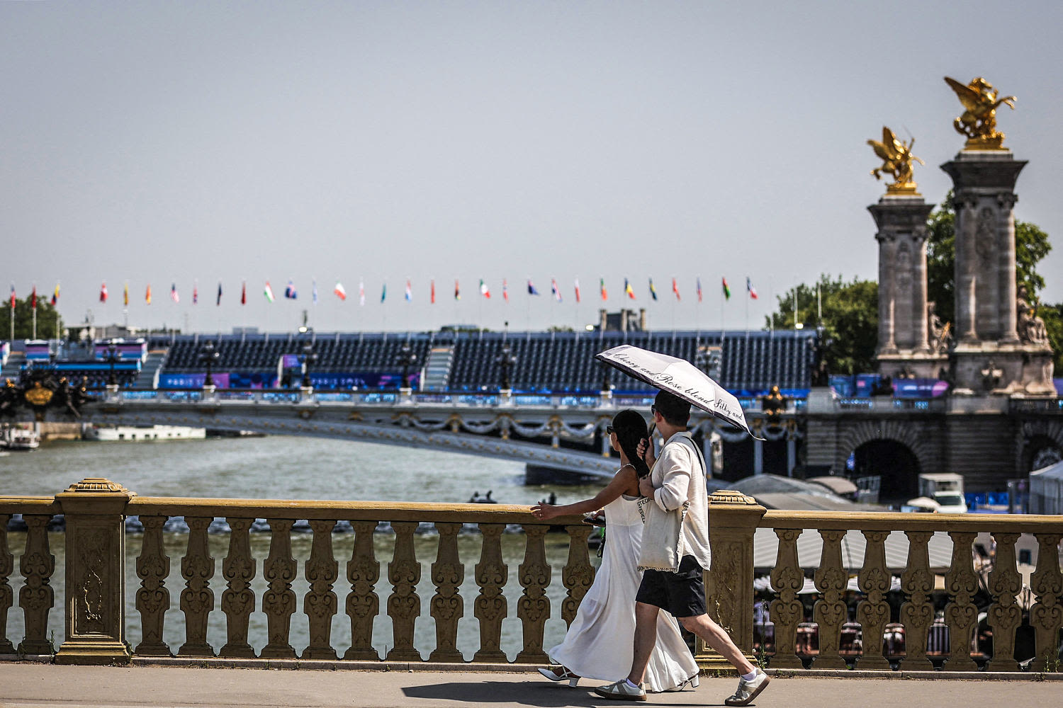 Triathletes will swim in Seine as last-minute testing shows the river is safe