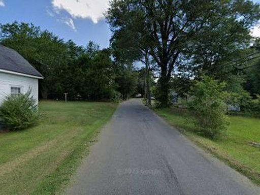 Woman, 62, shot in yard during gun battle between feuding teens has died, NC police say