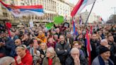 Thousands accuse Serbia's ruling populists of election fraud at a Belgrade rally