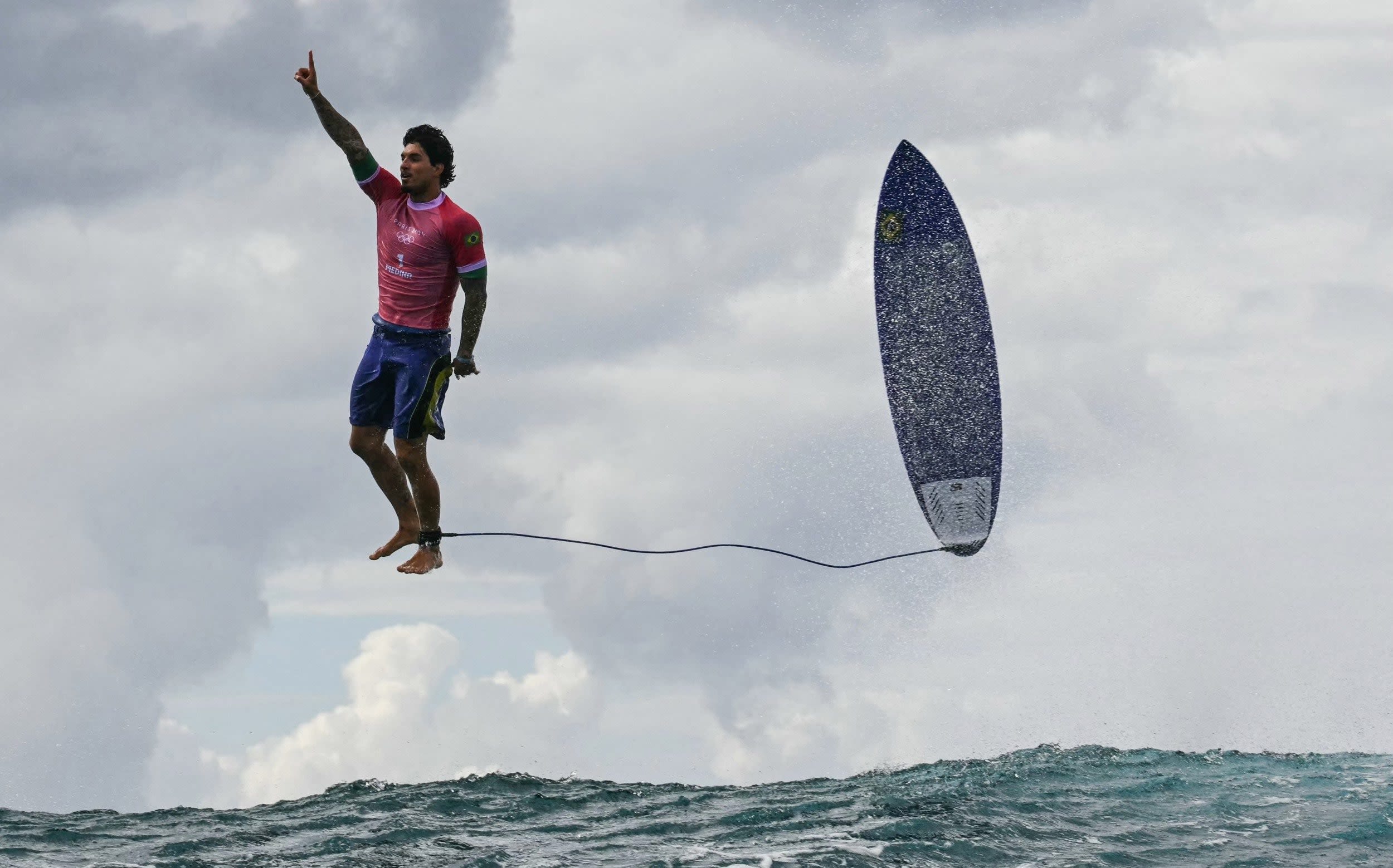 Gabriel Medina’s record-breaking ride bettered only by iconic celebration at Olympics surfing