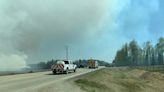 Out-of-control wildfires force thousands more Albertans to flee