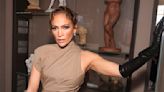 Jennifer Lopez debuts trench coat style at Paris show as Ben Affleck stays in US