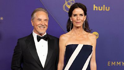 Don Johnson's wife of 25 years towers over him at the Emmys