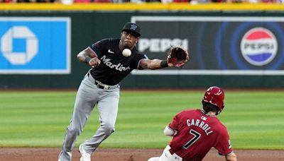 Diamondbacks score early, hold off Marlins despite big game from Burger