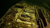 Divers find 19th-century shipwreck laden with unopened bottles of champagne and precious mineral water