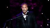 'Yellowstone' star Kevin Costner accepts Golden Globe from comfort of bed after missing ceremony