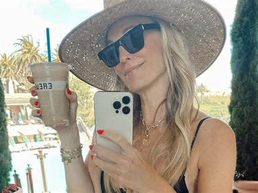 Molly Sims showcases her incredible figure in black bathing suit as she enjoys her namesake Erewhon smoothie