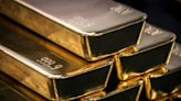 Europe stocks dented by UK inflation; gold hits new peak