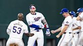 Memorable opener: Rangers celebrate 2023 championship, then beat Cubs in 10 innings