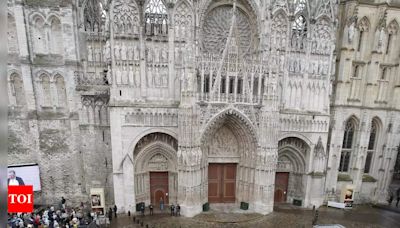 Fire in towering spire of medieval cathedral in French city of Rouen is under control - Times of India