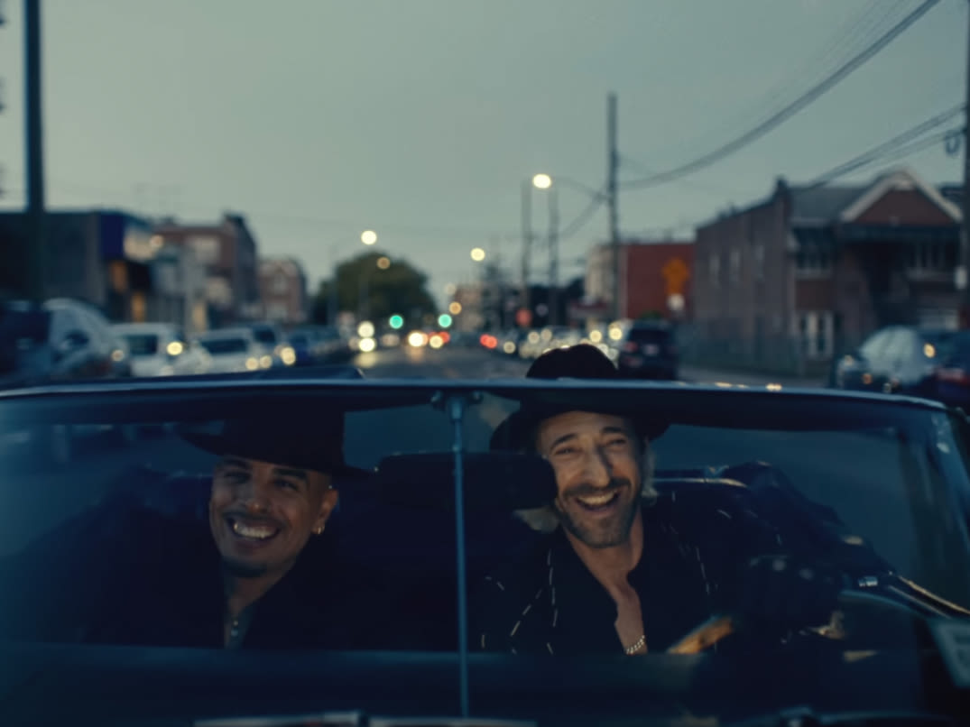 Adrian Brody Joins Rauw Alejandro in His Cinematic Video for ‘Déjame Entrar’