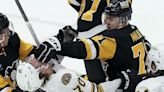 Brad Marchand caps Bruins' four-goal second period in 6-4 win over Penguins