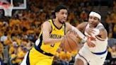 Indiana's Tyrese Haliburton drives past Miles McBride in the Pacers' series-clinching victory over the New York Knicks in the NBA Eastern Conference semi-finals