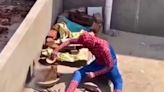 Watch: Man In Spiderman Suit Makes Rotis On Terrace - News18