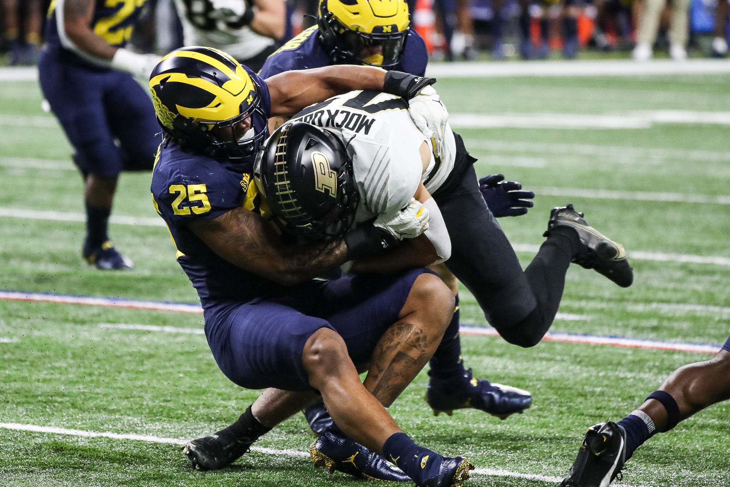 Michigan's Junior Colson reunited with Jim Harbaugh, Chargers in Round 3 of NFL draft