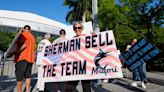 A handful of disgruntled Marlins fans protest the team following the Luis Arraez trade