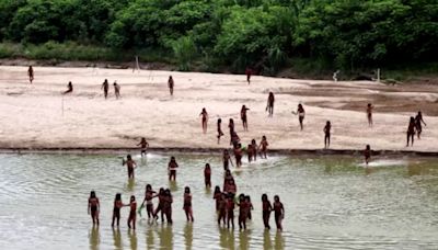 Rare photos reveal uncontacted tribe in Peruvian Amazon as loggers move in