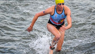 Belgian triathlete who fell ill after Seine race says she did not contract E. coli