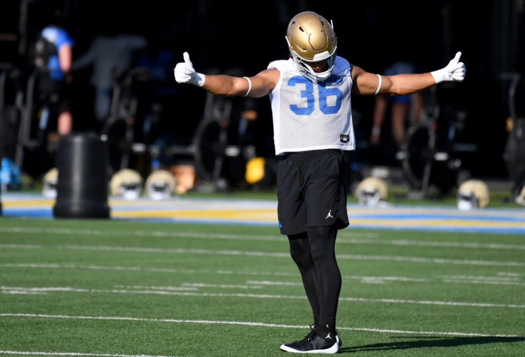 UCLA football walk-on Joshua Swift begins his next chapter by wearing No. 36
