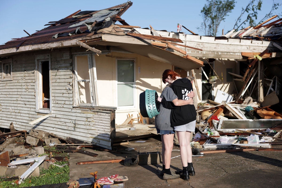 Dozens trapped in FedEx facility as tornadoes devastate US Midwest