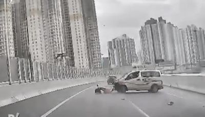 Taxi collides with barrier and spins, driver escapes unharmed on Tsing Sha Highway - Dimsum Daily