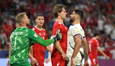 Denmark go through in second – thanks to a yellow card shown to Slovenia coach