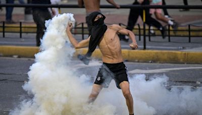 Tear gas fired at protesters in Venezuela after Maduro 'wins' election