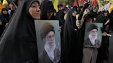 Iran’s supreme leader prays over the coffin of Hamas leader Haniyeh, whose killing risks a wider war