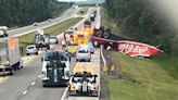 VIDEO: Driver flown to hospital after truck rolls over on turnpike in Canfield