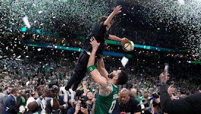 Celtics star Jayson Tatum overcome with emotion as he celebrates NBA championship with his son