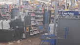 Strong storm dumps rain and hail — on Walmart checkout lanes, Wisconsin videos show