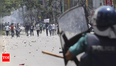 Bangladesh police fire tear gas, sound grenades as protesters return to streets - Times of India