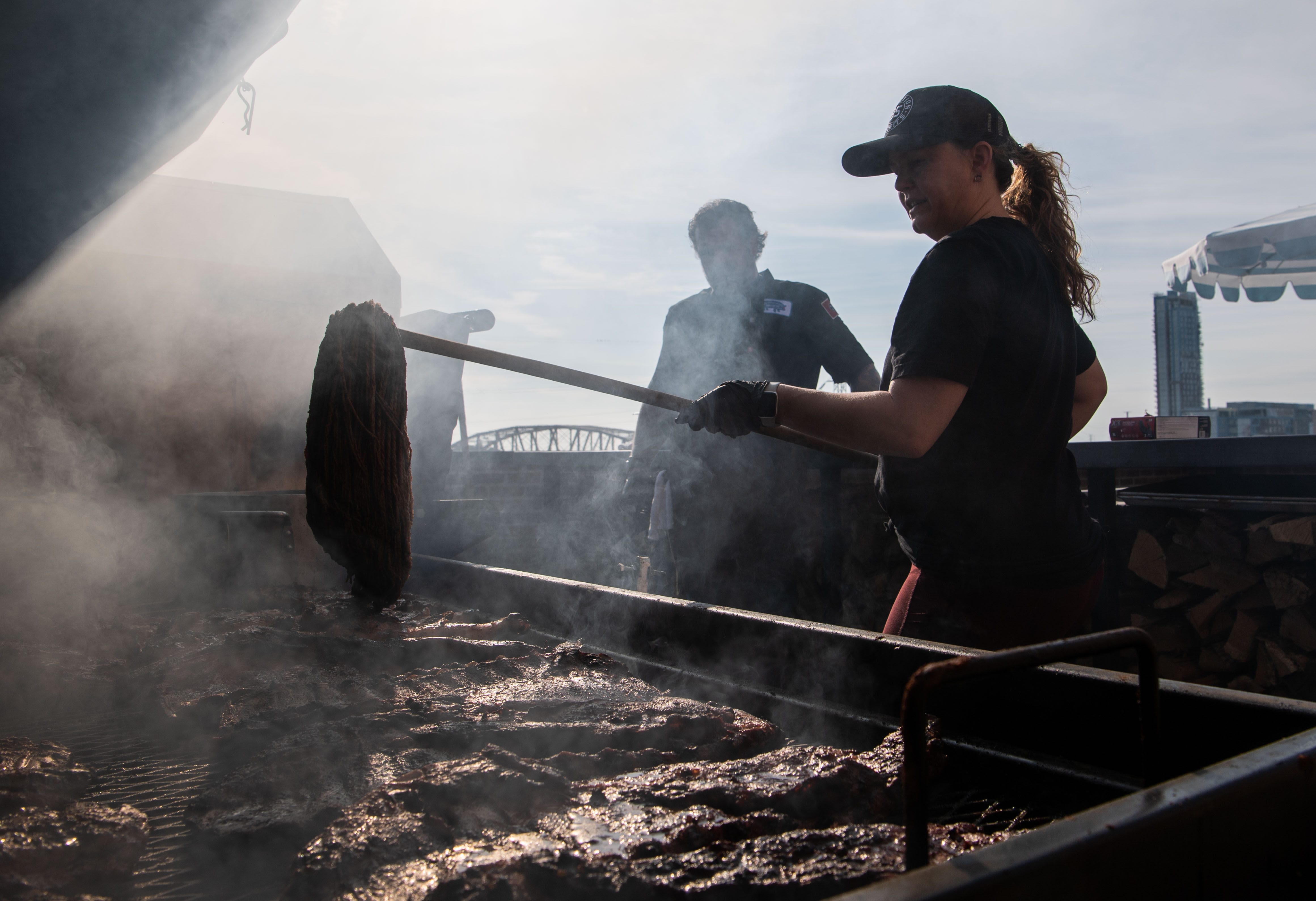 Cooking whole hog barbecue on a Broadway rooftop in Nashville: Pitmasters for a day