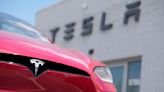 Tesla's stock leaps on reports of Chinese approval for the company's driving software