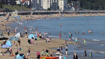 UK heatwave sparks yellow health warnings as temperatures soar to a sizzling 30C