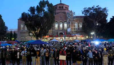 Police begin removing barricades at a pro-Palestinian demonstrators' encampment at UCLA